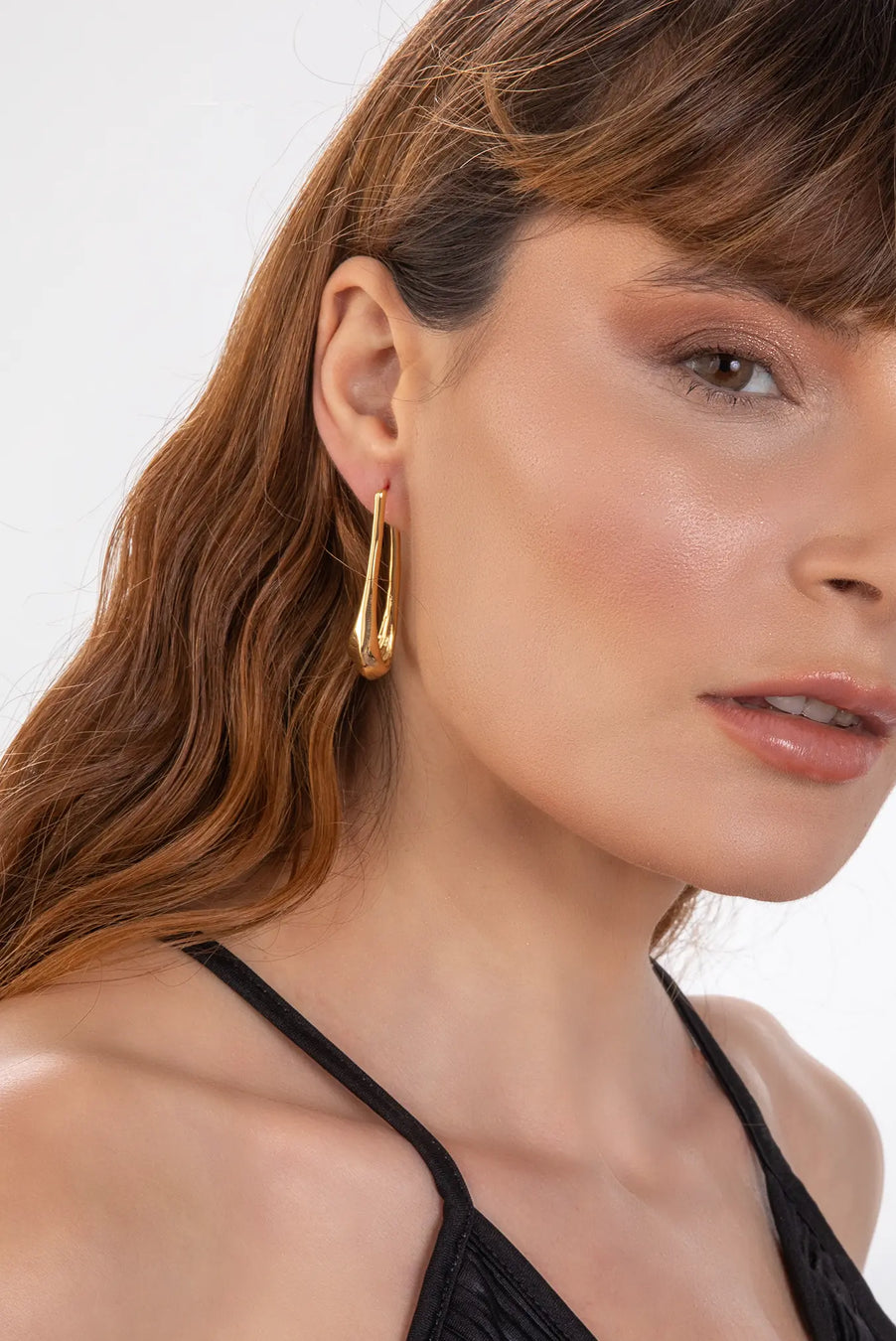 ATARAXIA Earrings. Elongated elliptical hoops, 18K gold vermeil, handmade, hypoallergenic, water-resistant